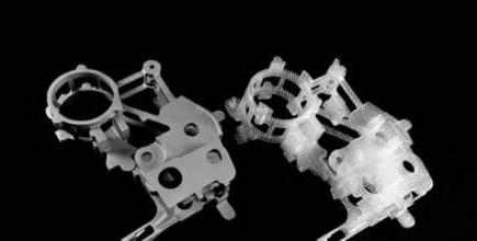 SLA prototype part on the left and investment cast part on the right